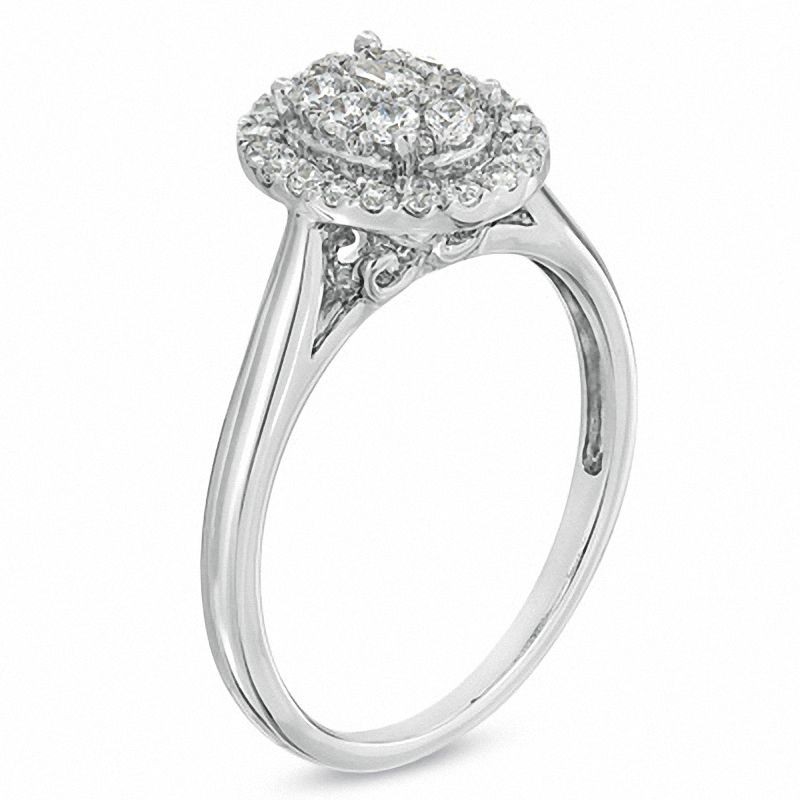 Main Image 2 of 1/2 CT. T.W. Diamond Cluster Oval Frame Engagement Ring in 14K White Gold