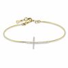 Thumbnail Image 1 of 1/6 CT. T.W. Diamond Sideways Cross Bangle in 10K Gold - 7.5"