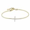 Thumbnail Image 0 of 1/6 CT. T.W. Diamond Sideways Cross Bangle in 10K Gold - 7.5"