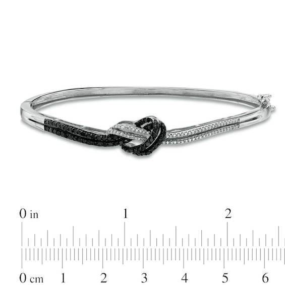 1/2 CT. T.w. Enhanced Black and White Diamond Knot Bangle in Sterling Silver