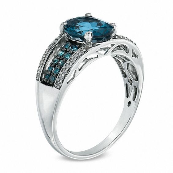 Oval London Blue Topaz and 1/4 CT. T.w. Enhanced Blue and White Diamond Ring in 10K White Gold