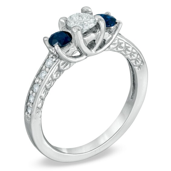 1/2 CT. T.w. Diamond and Blue Sapphire Three Stone Engagement Ring in 14K White Gold
