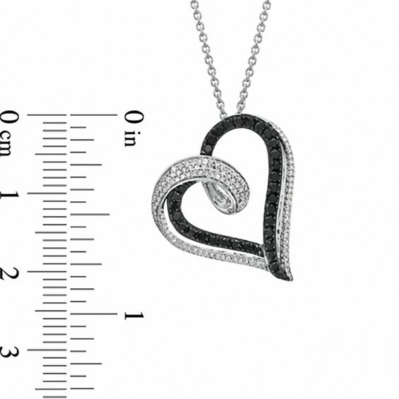 1/2 CT. T.w. Enhanced Black and White Diamond Looping Heart Pendant in Sterling Silver