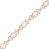 Thumbnail Image 1 of Oval Lab-Created Opal and Diamond Accent Bracelet in Sterling Silver with 14K Rose Gold Plate - 7.25"