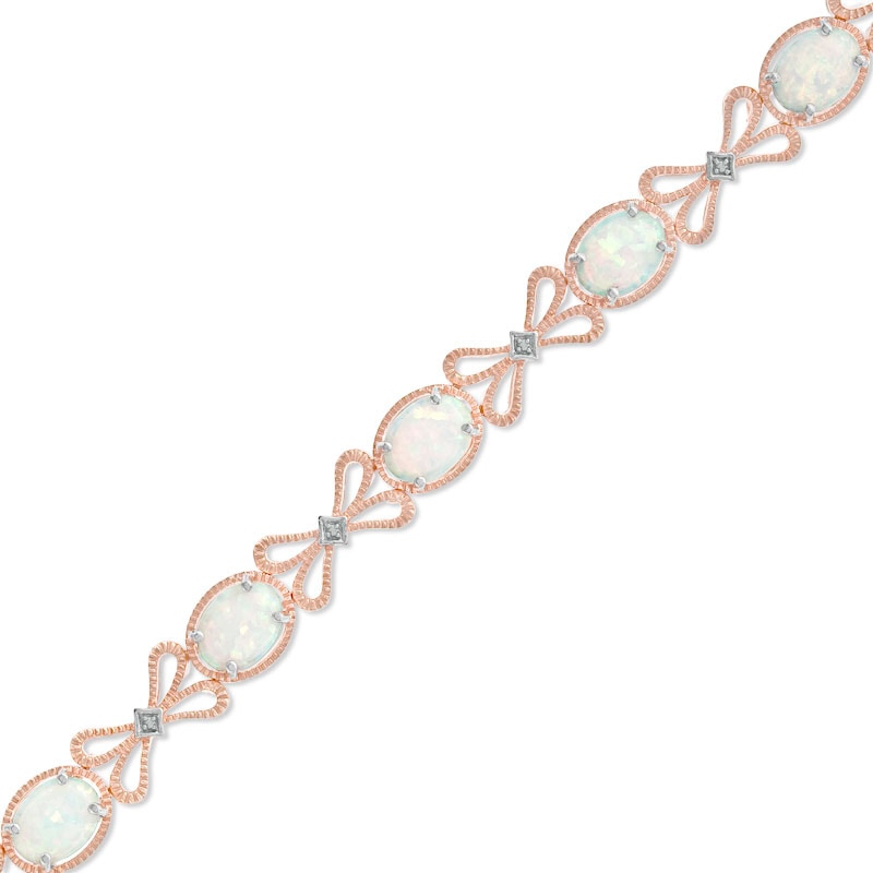 Main Image 1 of Oval Lab-Created Opal and Diamond Accent Bracelet in Sterling Silver with 14K Rose Gold Plate - 7.25"