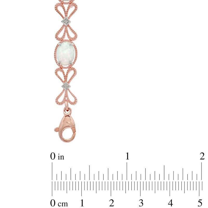 Main Image 3 of Oval Lab-Created Opal and Diamond Accent Bracelet in Sterling Silver with 14K Rose Gold Plate - 7.25"