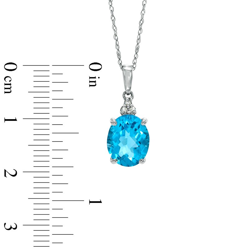 Main Image 2 of Oval Swiss Blue Topaz and Diamond Accent Pendant in 10K White Gold