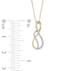 Thumbnail Image 1 of 1/10 CT. T.W. Diamond Swirl Infinity Loop Pendant in 10K Gold