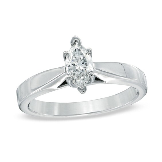 Celebration Ideal 1/2 CT. Marquise Diamond Solitaire Engagement Ring in 14K White Gold (J/I1) Celebration Ideal 1/2 CT. Marquise Diamond Solitaire Engagement Ring in 14K White Gold (J/I1)