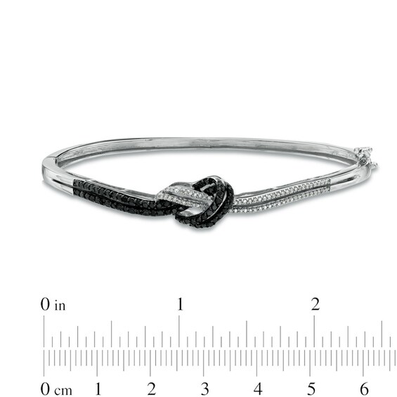 1/2 CT. T.w. Enhanced Black and White Diamond Knot Bangle in Sterling Silver