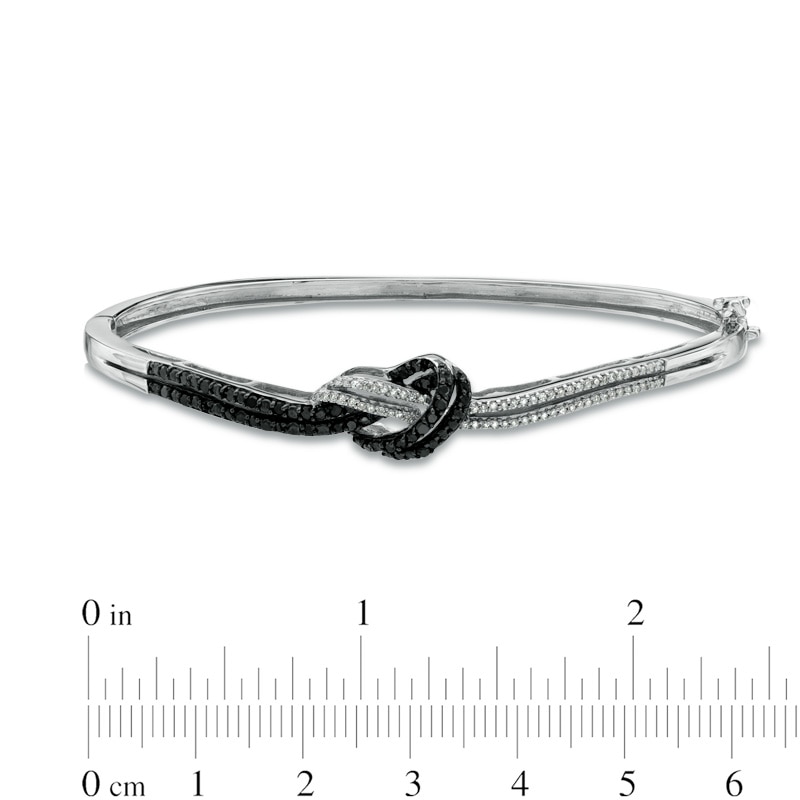 Main Image 2 of 1/2 CT. T.W. Enhanced Black and White Diamond Knot Bangle in Sterling Silver