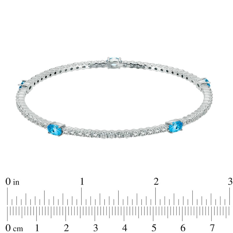 Main Image 2 of Oval Swiss Blue Topaz and Lab-Created White Sapphire Bangle in Sterling Silver - 8.0"