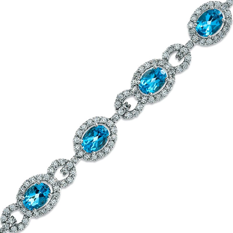 Main Image 1 of Oval Blue Topaz and Lab-Created White Sapphire Bracelet in Sterling Silver - 7.25"