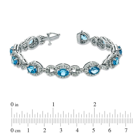 Oval Blue Topaz and Lab-Created White Sapphire Bracelet in Sterling Silver - 7.25"