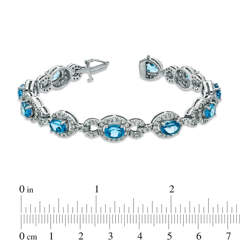 Main Image 2 of Oval Blue Topaz and Lab-Created White Sapphire Bracelet in Sterling Silver - 7.25"