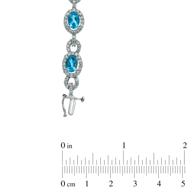 Main Image 3 of Oval Blue Topaz and Lab-Created White Sapphire Bracelet in Sterling Silver - 7.25"