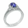 Thumbnail Image 1 of Oval Tanzanite and 1/4 CT. T.W. Diamond Bridal Set in 14K White Gold