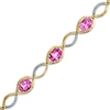 Thumbnail Image 1 of Oval Lab-Created Pink Sapphire and Diamond Accent Bracelet in Sterling Silver with 14K Rose Gold Plate - 7.25"