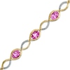 Thumbnail Image 0 of Oval Lab-Created Pink Sapphire and Diamond Accent Bracelet in Sterling Silver with 14K Rose Gold Plate - 7.25"