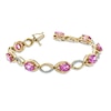 Thumbnail Image 1 of Oval Lab-Created Pink Sapphire and Diamond Accent Bracelet in Sterling Silver with 14K Rose Gold Plate - 7.25"