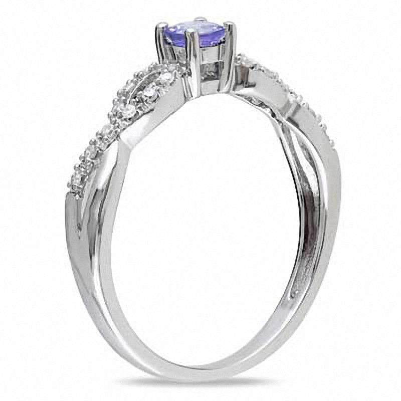3.5mm Tanzanite and 1/20 CT. T.W. Diamond Twist Promise Ring in Sterling Silver