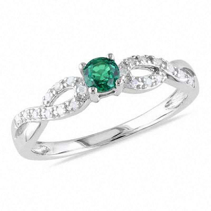 3.5mm Lab-Created Emerald and 1/15 CT. T.W. Diamond Twist Ring in Sterling Silver