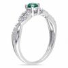 Thumbnail Image 1 of 3.5mm Lab-Created Emerald and 1/15 CT. T.W. Diamond Twist Ring in Sterling Silver