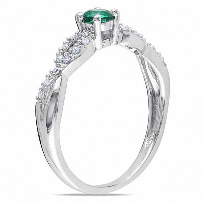 3.5mm Lab-Created Emerald and 1/15 CT. T.W. Diamond Twist Ring in Sterling Silver