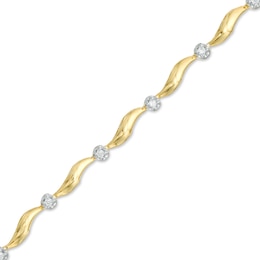1/6 CT. T.W. Diamond Cluster Station Bracelet in 10K Gold