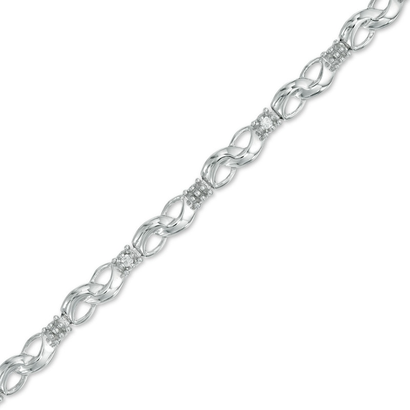 1/10 CT. T.W. Diamond Infinity Bracelet in 10K White Gold