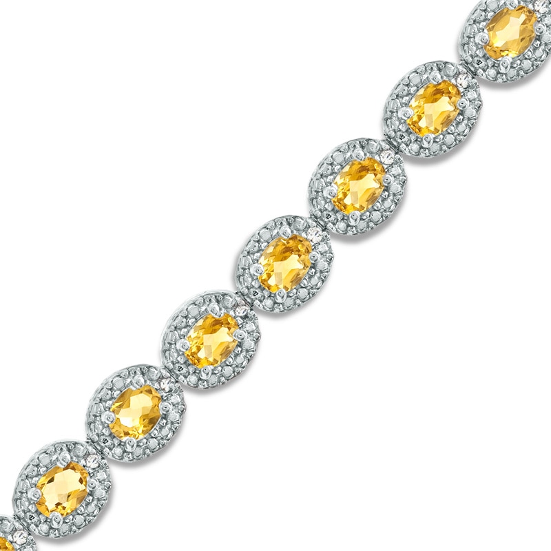 Main Image 1 of Oval Lab-Created Yellow Sapphire and 1/15 CT. T.W. Diamond Bracelet in Sterling Silver - 7.5"