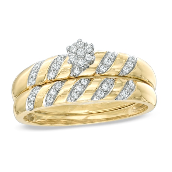 1/6 CT. T.w. Diamond Flower Cluster Bridal Set in 10K Gold