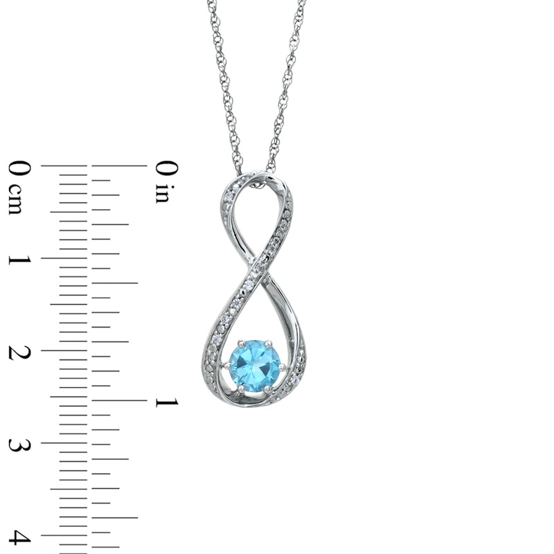 Main Image 2 of 5.5mm Blue Topaz and Diamond Accent Infinity Pendant in Sterling Silver