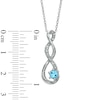 Thumbnail Image 1 of 4.5mm Blue Topaz and Diamond Accent Twist Pendant in Sterling Silver