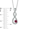 Thumbnail Image 1 of 4.5mm Lab-Created Ruby and Diamond Accent Twist Pendant in Sterling Silver