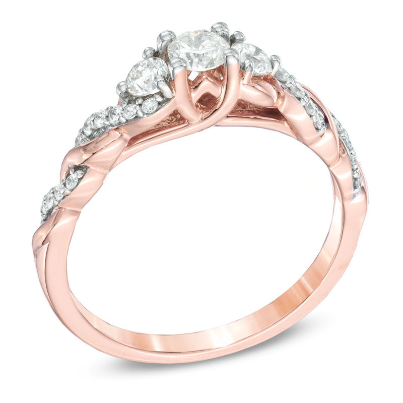 Main Image 2 of 1/2 CT. T.W. Diamond Past Present Future® Twist Engagement Ring in 14K Rose Gold