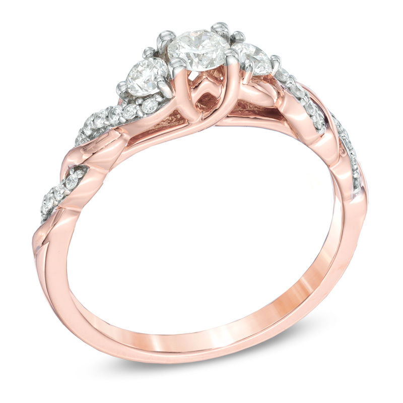 1/2 CT. T.W. Diamond Past Present Future® Twist Engagement Ring in 14K Rose Gold