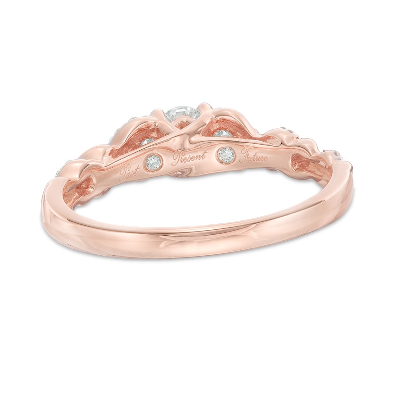 Main Image 3 of 1/2 CT. T.W. Diamond Past Present Future® Twist Engagement Ring in 14K Rose Gold