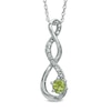 Thumbnail Image 0 of 4.5mm Peridot and Diamond Accent Twist Pendant in Sterling Silver