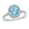 Thumbnail Image 0 of Oval Aquamarine and 1/5 CT. T.W. Diamond Frame Engagement Ring in 10K White Gold