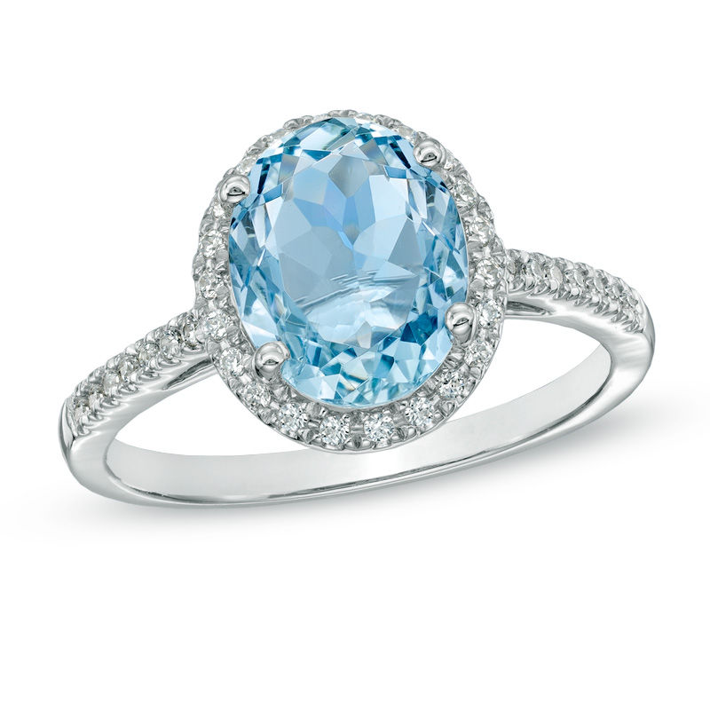 Oval Aquamarine and 1/5 CT. T.W. Diamond Frame Engagement Ring in 10K White Gold