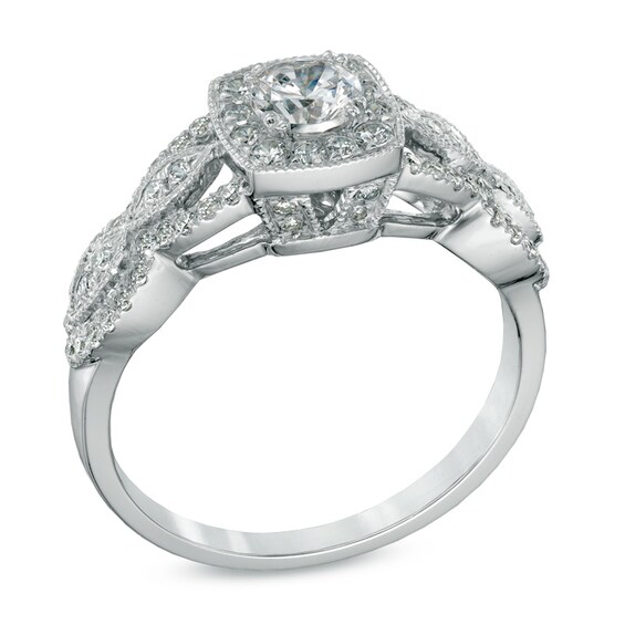 Celebration Ideal 3/4 CT. T.w. Certified Diamond Twist Frame Engagement Ring in 14K White Gold (I/I1)