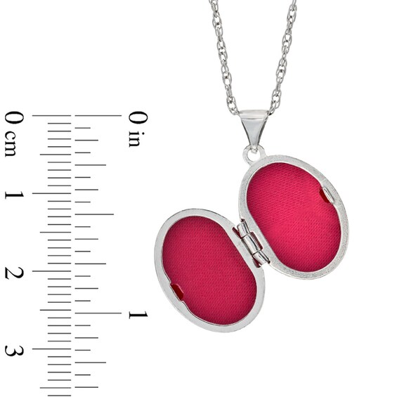 Diamond Accent Oval Locket with Heart in Sterling Silver and 14K Rose Gold Plate Diamond Accent Oval Locket with Heart in Sterling Silver and 14K Rose Gold Plate