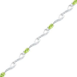 Peridot August Birthstone Birthstones Collections Zales Oval Peridot And Diamond Accent Bracelet In Sterling Silver 7 5