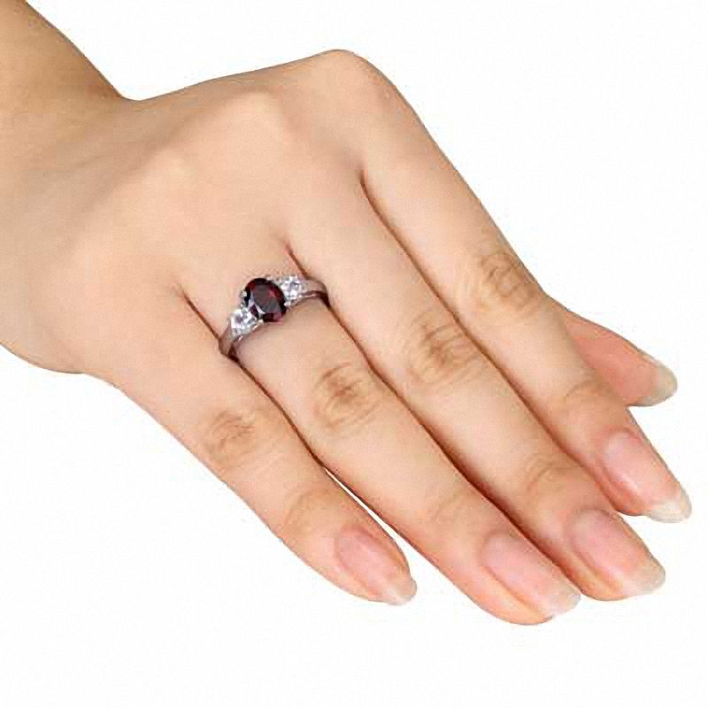 Oval Garnet and Lab-Created White Sapphire Three Stone Ring in Sterling Silver