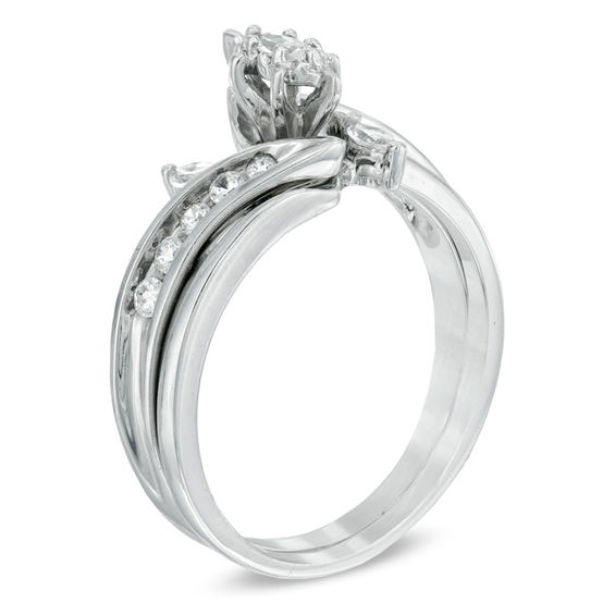 1/2 CT. T.w. Marquise Diamond Three Stone Slant Bridal Set in 10K White Gold