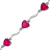 Thumbnail Image 1 of 8.0mm Heart-Shaped Lab-Created Ruby and Diamond Accent Bracelet in Sterling Silver - 7.25"