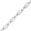 Thumbnail Image 1 of Oval Lab-Created Opal and Diamond Accent Bracelet in Sterling Silver - 7.25"