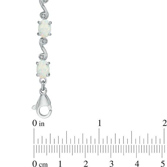 Oval Lab-Created Opal and Diamond Accent Bracelet in Sterling Silver - 7.25"