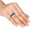 Thumbnail Image 2 of Graduated Lab-Created Blue Sapphire Ring in Sterling Silver